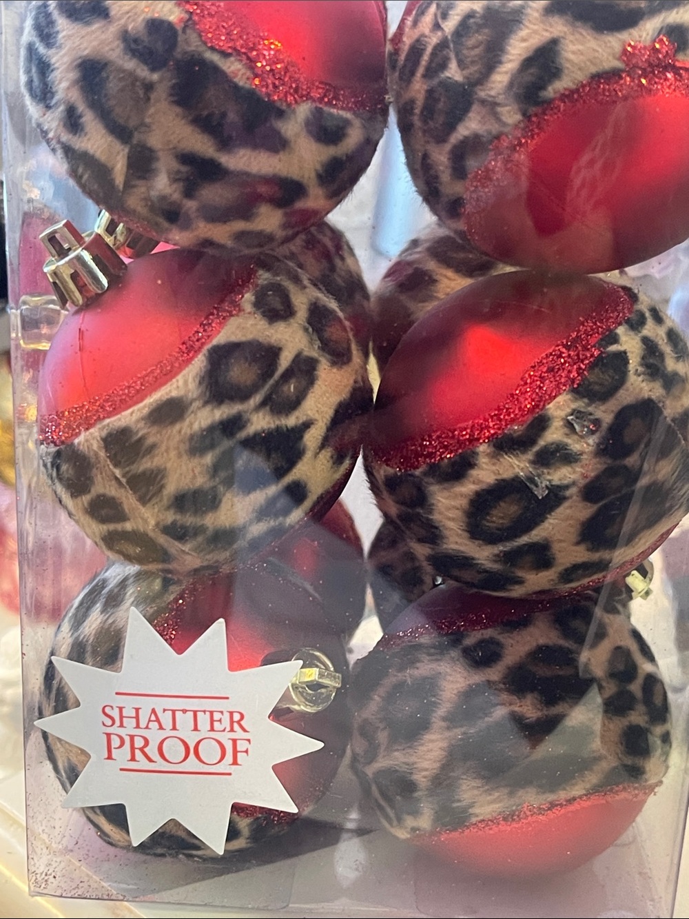 Fuzzy leopard print on red shatterproof 2.25”ball ornament - set of 12